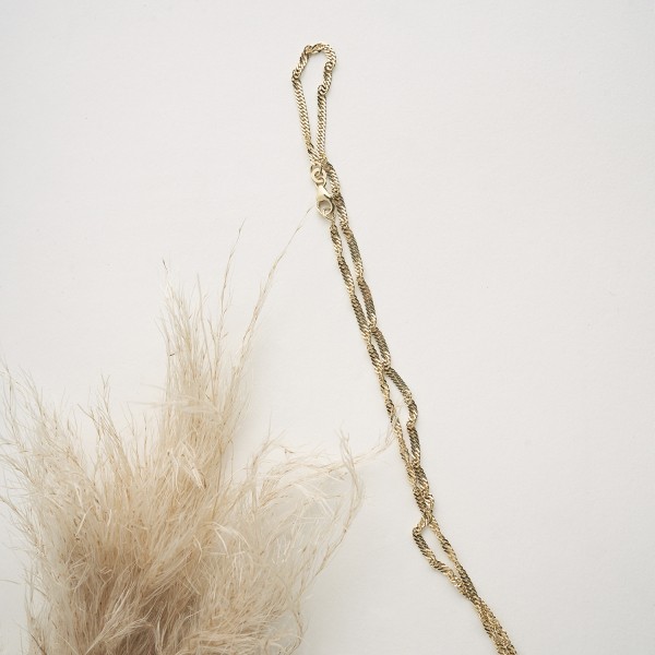 Goldkette als Singapurkette in Gelbgold 750 / 18 Karat, 100 cm lang, 2.4 mm breit, Gewicht ca. 11.3 g.