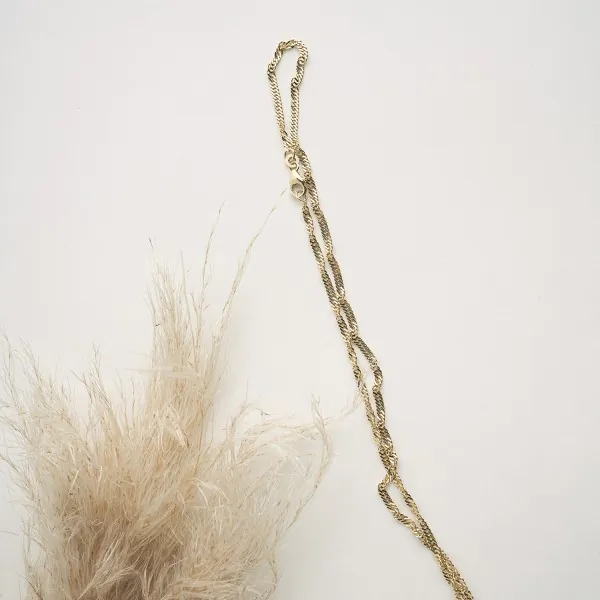 Goldkette als Singapurkette in Gelbgold 750 / 18 Karat, 80 cm lang, 2.4 mm breit, Gewicht ca. 9 g.