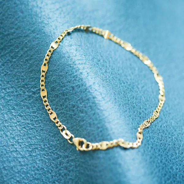 Armband als Panzerstegkette in Gelbgold 750 / 18 Karat, 21.5 cm lang, 3.1 mm breit, Gewicht ca. 3 g.