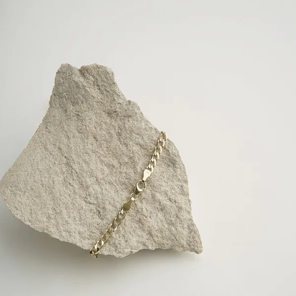 Armband als Panzerkette weit in Gelbgold 585 / 14 Karat, 20.5 cm lang, 3.9 mm breit, Gewicht ca. 4.4 g.