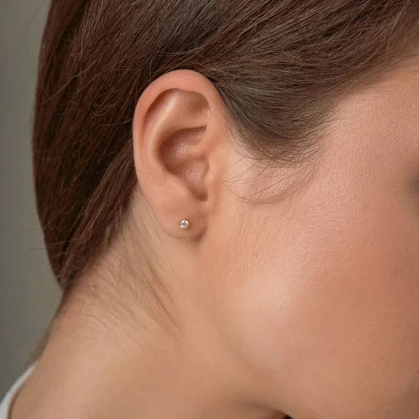 0,20 Karat Diamant Ohrstecker Gelbgold in 3 mm