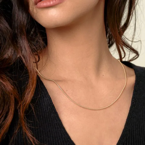 Goldkette als Ankerkette diamantiert in Gelbgold 375 / 9K, 34 cm lang, 1,3 mm breit, Gewicht ca. 1.7 g.