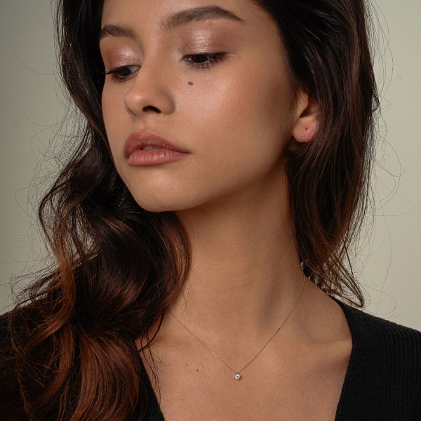 Diamantanhänger in 0,20 Karat, Gelbgold 585 / 14 Karat, mit einer 585ger Goldkette in 42 cm lang, Gewicht ca. 0,96 g.