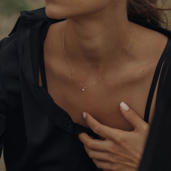 Diamantanhänger in 0,20 Karat, Gelbgold 585 / 14 Karat, mit einer 585ger Goldkette in 42 cm lang, Gewicht ca. 0,90 g.