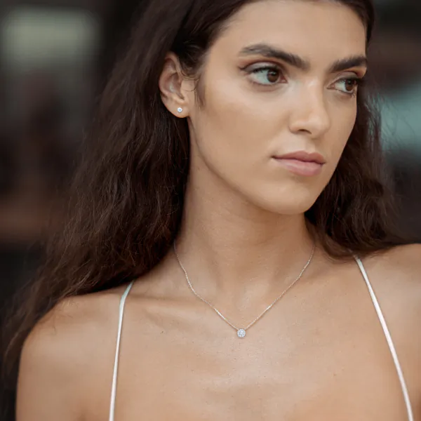 Diamantanhänger in 0,1 Karat, Weißgold 585 / 14 Karat, mit einer 585ger Goldkette in 45 (42+3) cm lang, Gewicht ca. 1,7 g.