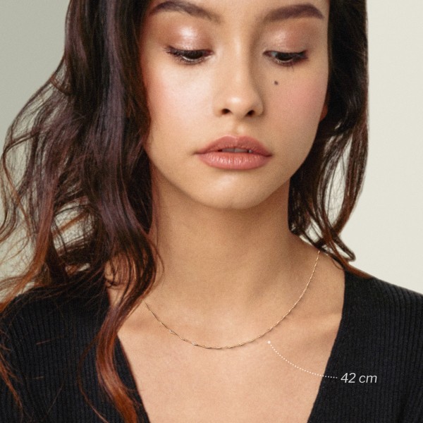 Goldkette als Singapurkette in Gelbgold 585 / 14 Karat, 100 cm lang, 1.2 mm breit, Gewicht ca. 3 g.