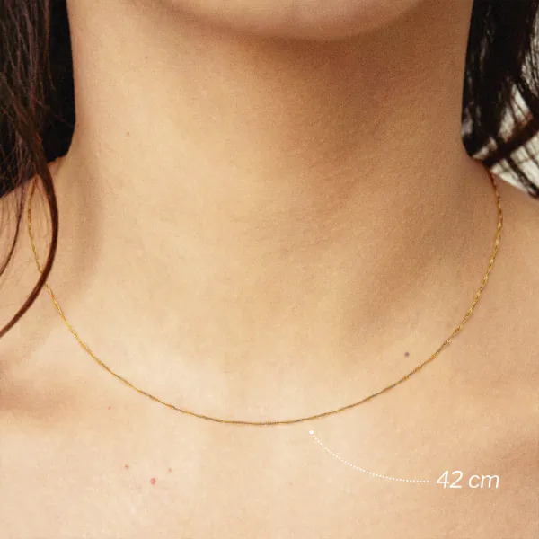 Goldkette als Singapurkette in Gelbgold 750 / 18 Karat, 70 cm lang, 1 mm breit, Gewicht ca. 1,9 g.