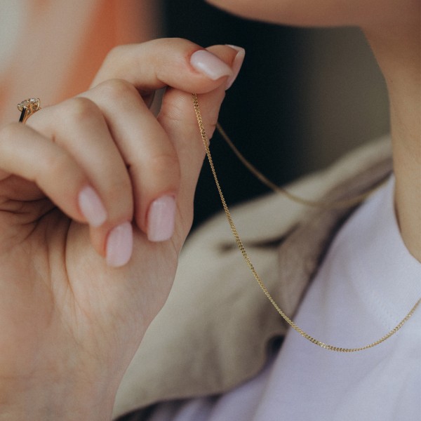 Goldkette als Panzerkette flach in Gelbgold 333 / 8K, 70 cm lang, 1,4 mm Breit, Gewicht ca. 3.3 g.