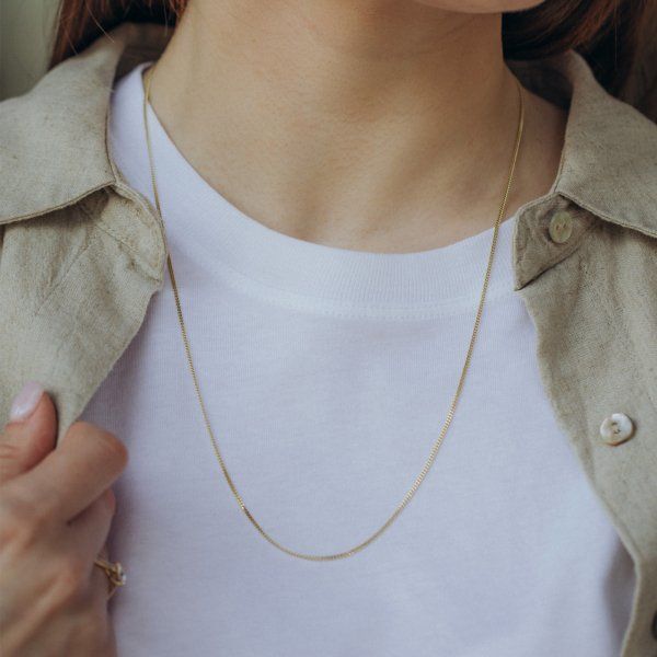 Goldkette als Panzerkette flach in Gelbgold 375 / 9K, 45 cm lang, 1,4 mm breit, Gewicht ca. 2.5 g.