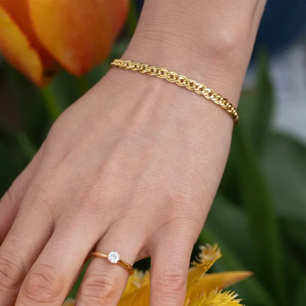Armband als Zwillingspanzerkette in Gelbgold 375 / 9 Karat, 19 cm lang, 4.8 mm breit, Gewicht ca. 3 g.