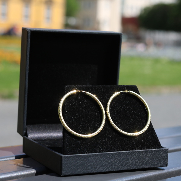 Ohrringe, Creolen mit Muster, Gelbgold 333 / 8K, Außendurchmesser 40 mm, Breite 2.5 mm, Gewicht ca. 1.9 g