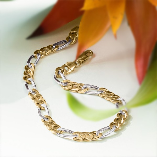 Armband als Figarokette hohl Bicolor in Gelbgold / Weißgold 585 / 14K, 21 cm lang, 5,7 mm breit, Gewicht ca. 5.6 g.