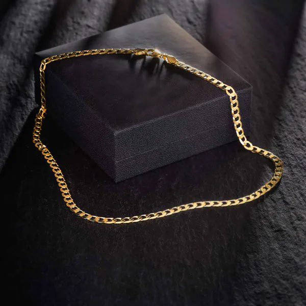 Goldkette als Panzerkette facettiert in Gelbgold 750 / 18 Karat, 55 cm lang, 5 mm breit, Gewicht ca. 19,3 g.