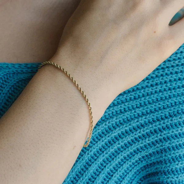 Armband als Kordelkette hohl Leichtversion in Gelbgold 750 / 18K, 18 cm lang, 2,1 mm breit, Gewicht ca. 1.5 g.