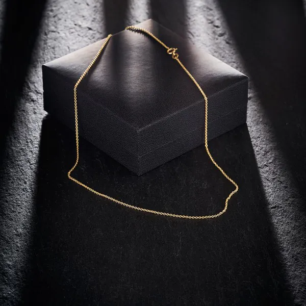 Goldkette als Ankerkette rund in Gelbgold 585 / 14K, 65 cm lang, 1,3 mm breit, Gewicht ca. 3.2 g.
