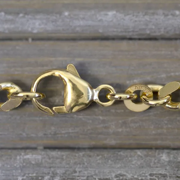 Armband als Panzerkette flach in Gelbgold 333 / 8K, 18,7 cm lang, 4,7 mm breit, Gewicht ca. 9.6 g.