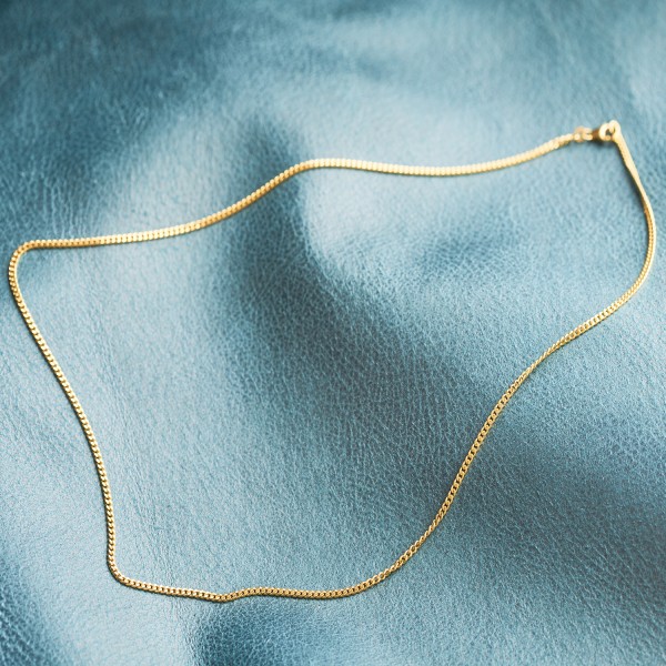 Goldkette als Panzerkette flach 1.1 Höhe in Gelbgold 750 / 18K, 50 cm lang, 2,4 mm breit, Gewicht ca. 11.3 g.