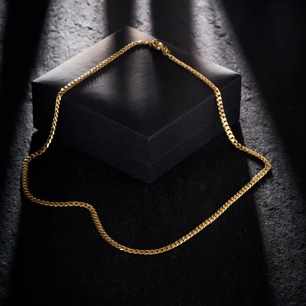 Goldkette als Panzerkette facettiert in Gelbgold 585 / 14K, 70 cm lang, 3,9 mm breit, Gewicht ca. 19.4 g.