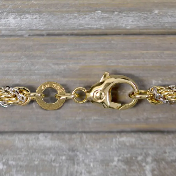 Armband als Kordelkette hohl Bicolor in Gelbgold / Weißgold 333 / 8K, 18,5 cm lang, 3,3 mm breit, Gewicht ca. 4.3 g.