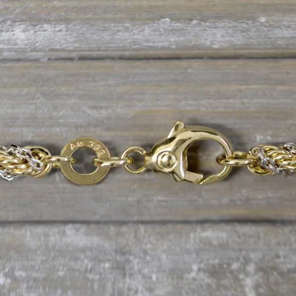 Goldkette als Kordelkette hohl in Bicolor Gelbgold / Weißgold 333 / 8K, 60 cm lang, 3,3 mm breit, Gewicht ca. 13.6 g.