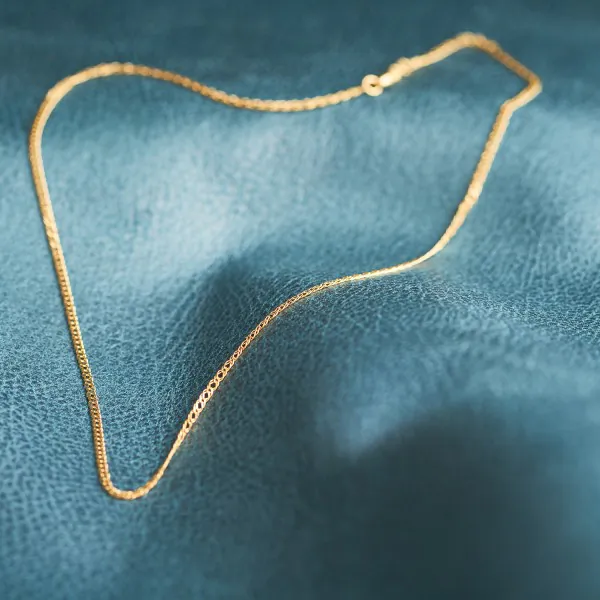 Goldkette als Zwillingspanzerkette in Gelbgold 585 / 14K, 70 cm lang, 2,1 mm breit, Gewicht ca. 4.7 g.