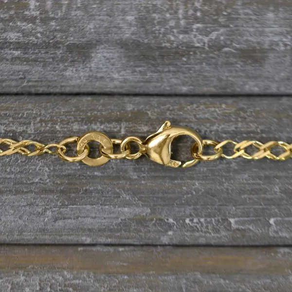 Armband als Zwillingspanzerkette in Gelbgold 333 / 8K, 18,5 cm lang, 2,1 mm breit, Gewicht ca. 1.3 g.