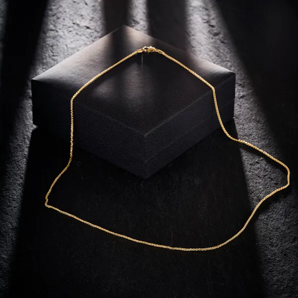 Goldkette als Zopfkette in Gelbgold 585 / 14K, 50 cm lang, 1,3 mm breit, Gewicht ca. 3.3 g.