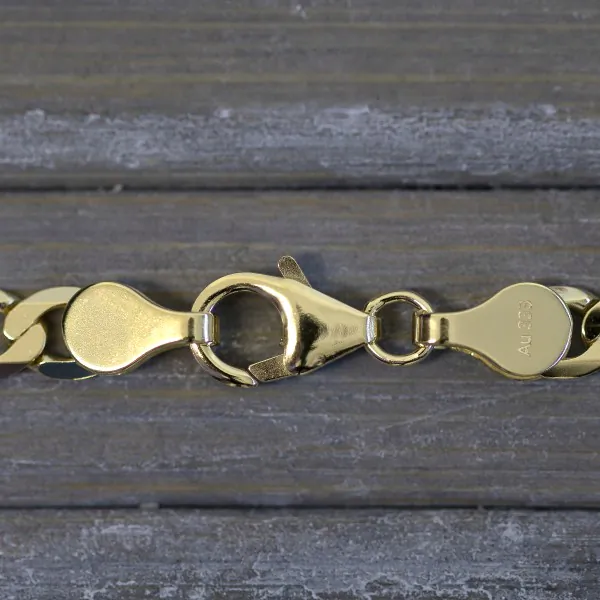 Armband als Panzerkette facettiert in Gelbgold 333 / 8 K, 18 cm lang, 5mm breit, Gewicht ca. 4.7 g.