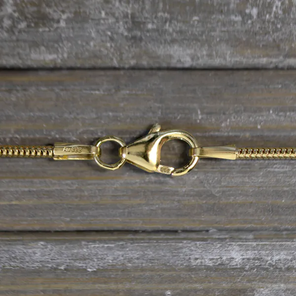 Goldkette als Schlangenkette in Gelbgold 333 / 8 Karat, 55 cm lang, 1.2 mm breit, Gewicht ca. 4.1