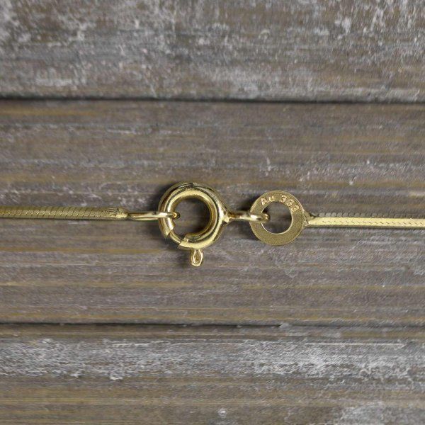 Goldkette als Schlangenkette diamantiert in Gelbgold 333 / 8K, 50 cm lang, 0,9 mm breit, Gewicht ca. 3.6 g.