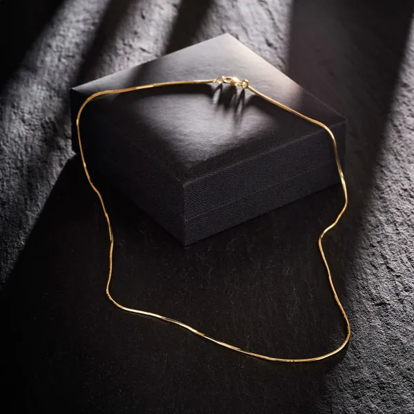 Goldkette als Schlangenkette diamantiert in Gelbgold 585 / 14K, 50 cm lang, 1 mm breit, Gewicht ca. 5.9 g.