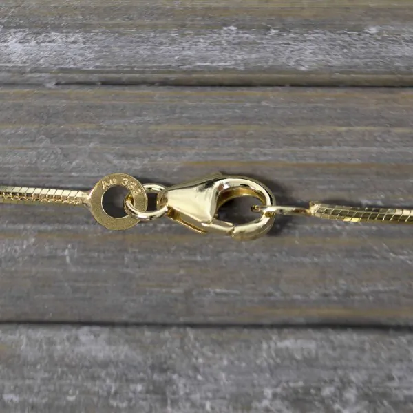 Goldkette als Schlangenkette diamantiert in Gelbgold 333 / 8K, 50 cm lang, 1 mm breit, Gewicht ca. 4.8 g.