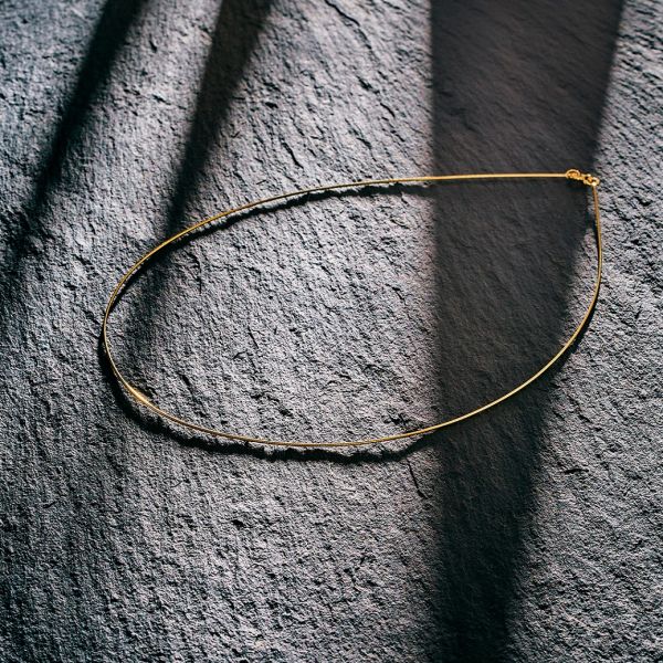Goldkette als Tondakette in Gelbgold 585 / 14K, 42 cm lang, 0,8 mm breit, Gewicht ca. 2.7 g.