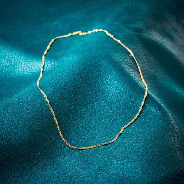 Goldkette als Singapurkette in Bicolor Gelbgold / Weißgold 585 / 14K, 55 cm lang, 1,8 mm breit, Gewicht ca. 3.2 g.