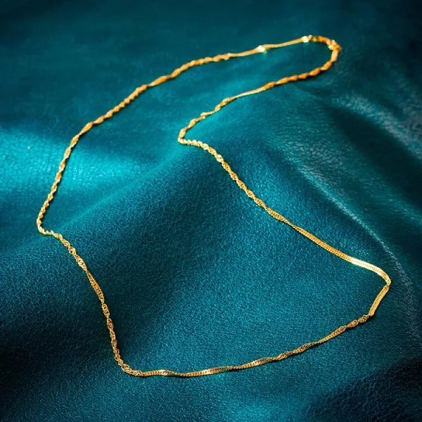 Goldkette als Singapurkette in Gelbgold 375 / 9K, 95 cm lang, 2,4 mm breit, Gewicht ca. 7.8 g.