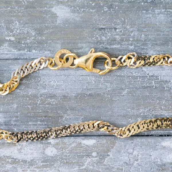 Armband als Singapurkette Bicolor in Gelbgold / Weißgold 333 / 8K, 19 cm lang, 2,4 mm breit, Gewicht ca. 1.7 g.