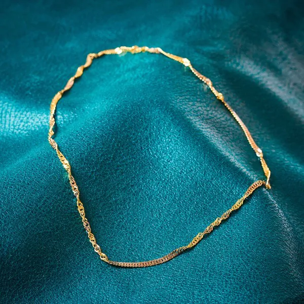 Goldkette als Singapurkette Bicolor in Gelbgold / Weißgold 333 / 8K, 45 cm lang, 2,9 mm breit, Gewicht ca. 5.4 g.