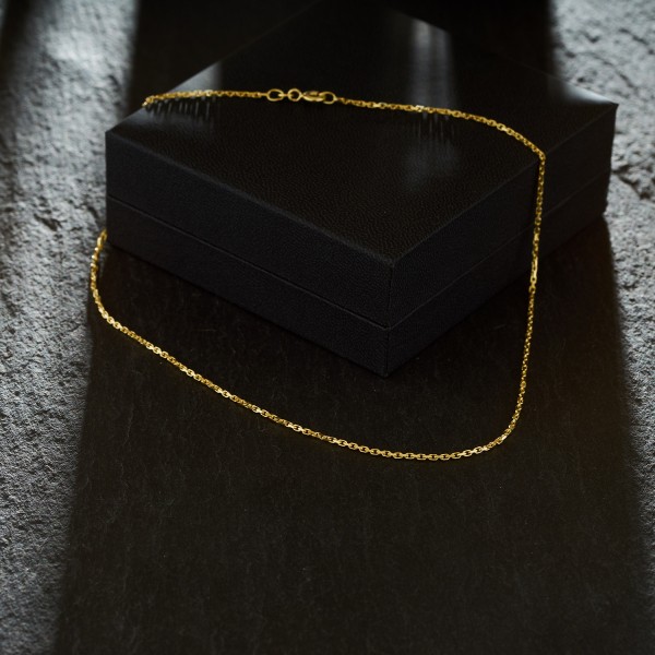 Goldkette als Ankerkette stirnseitig diamantiert in Gelbgold 585 / 14K, 50 cm lang, 1,3 mm breit, Gewicht ca. 4.5 g.
