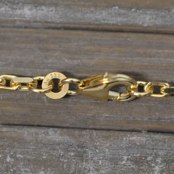 Goldkette als Ankerkette diamantiert in Gelbgold 333 / 8K, 50 cm lang, 2,5 mm breit, Gewicht ca. 12.5 g.
