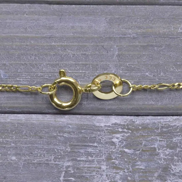 Goldkette als Figarokette diamantiert in Gelbgold 333 / 8K, 45 cm lang, 1,1 mm breit, Gewicht ca. 1.2 g.