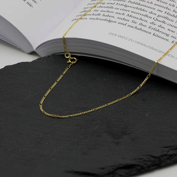 Goldkette als Figarokette diamantiert in Gelbgold 585 / 14K, 60 cm lang, 1,5 mm breit, Gewicht ca. 3.2 g.