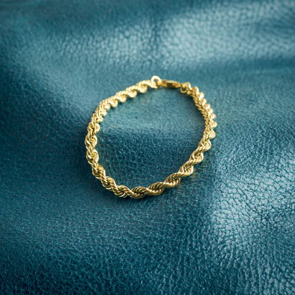 Armband als Kordelkette hohl Leichtversion in Gelbgold 333 / 8K, 21 cm lang, 4,4 mm breit, Gewicht ca. 4.3 g.