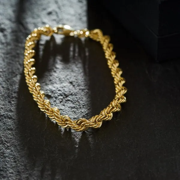 Armband als Kordelkette hohl in Gelbgold 585 / 14K, 21 cm lang, 5 mm breit, Gewicht ca. 7.6 g.