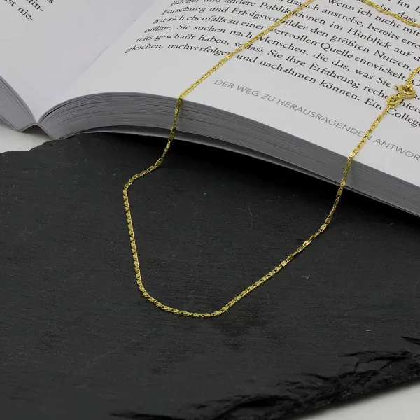 Goldkette als S-Panzerkette in Gelbgold 585 / 14K, 38 cm lang, 1,3 mm breit, Gewicht ca. 1.9 g.