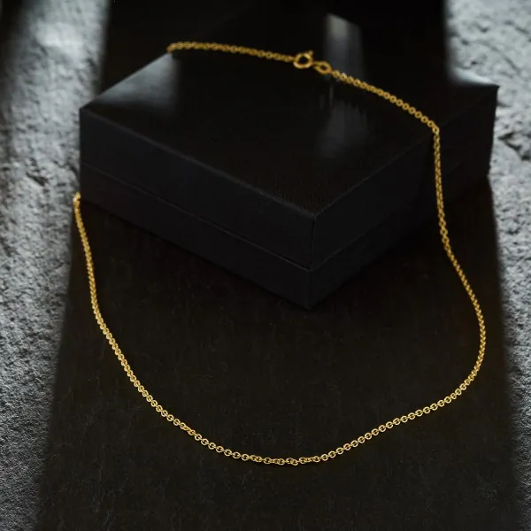 Goldkette als Ankerkette rund in Gelbgold 375 / 9K, 60 cm lang, 2 mm breit, Gewicht ca. 5.6 g.
