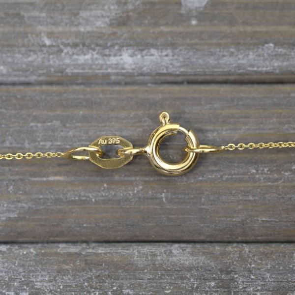 Goldkette als Ankerkette flach in Gelbgold 375 / 9K, 45 cm lang, 0,8 mm breit, Gewicht ca. 0.8 g.