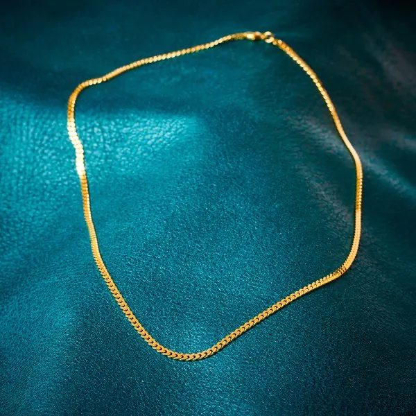 Goldkette als Panzerkette flach in Gelbgold 375 / 9K, 55 cm lang, 2,7 mm breit, Gewicht ca. 9.2 g.