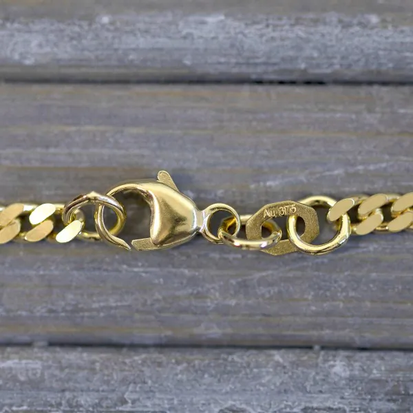 Armband als Panzerkette flach in Gelbgold 375 / 9K, 20 cm lang, 2.7 mm breit, Gewicht ca. 3.6 g.