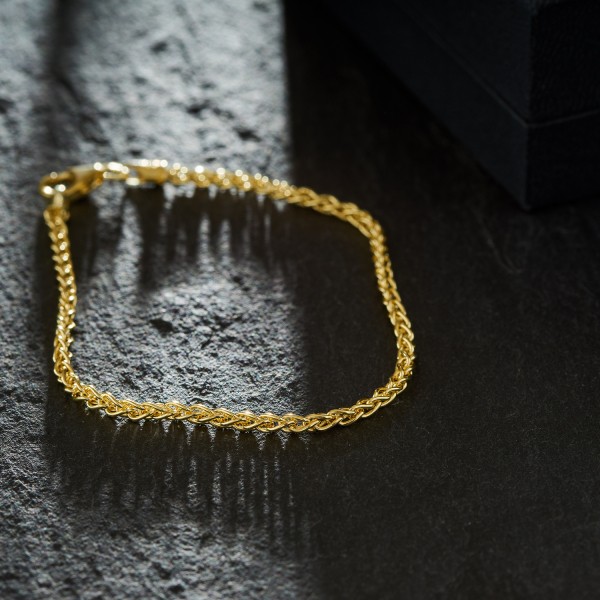 Armband als Zopfkette in Gelbgold 333 / 8 K, 21 cm lang, 2,5mm breit, Gewicht ca. 4.5 g.