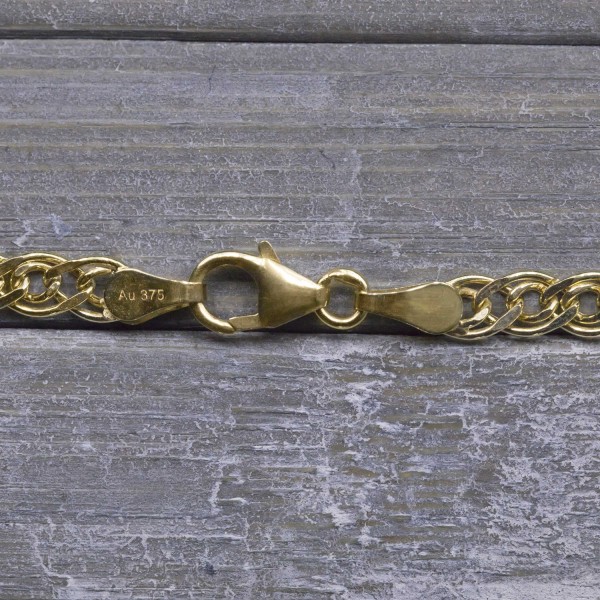 Armband als Zwillingspanzerkette in Gelbgold 375 / 9K, 21 cm lang, 3,9 mm breit, Gewicht ca. 2.2 g.